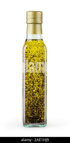 Olive oil with basil in glass bottle isolated on white backgound with clipping path Stock Photo