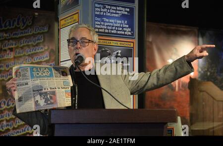 Los Angeles, United States. 06th Dec, 2019. Creator, producer and writer Bob Gale holds up a 1986 issue of USA Today with the headline, Reagan: 'It's Back to future' during a private gala to celebrate the opening of ''Back To The Future' Trilogy: The Exhibit' to pay tribute to all three films at the Hollywood Museum in Los Angeles on Thursday, December 5, 2019. Photo by Jim Ruymen/UPI Credit: UPI/Alamy Live News Stock Photo