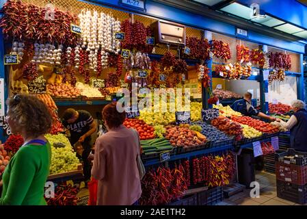 People shopping at Central Market Hall, the largest and oldest indoor market in Budapest, Hungary Stock Photo