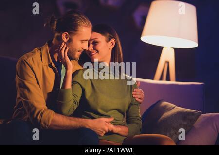 Close-up portrait of his he her she nice attractive lovely affectionate tender lovable cheerful dreamy couple girl sitting on divan spending day Stock Photo