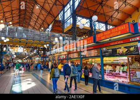 People shopping at Central Market Hall, the largest and oldest indoor market in Budapest, Hungary Stock Photo
