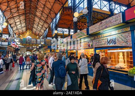 People shopping at Central Market Hall, the largest and oldest indoor market in Budapest, Hungary