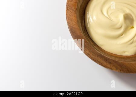 a handmade natural face cream in a wooden bowl on a white background Stock Photo