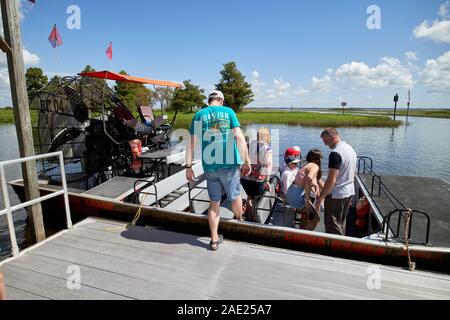 tourists boarding boggy creek airboat rides lake tohopekaliga central florida usa Stock Photo