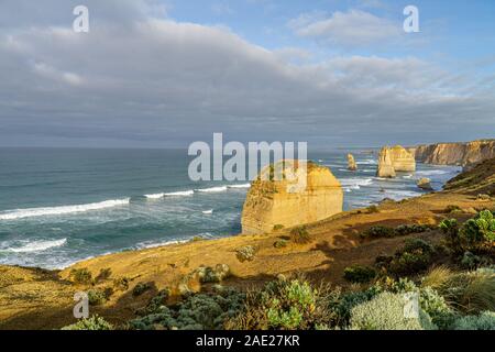 The Twelve Apostles are limestone rocks up to 60 metres high, standing in the sea. They are located between Princetown and Port Campbell in the Coasta Stock Photo