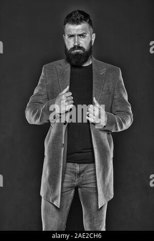 Dressing with style. Trendy hipster with mustache and beard in brutal hipster  style. Fashion caucasian man wearing casual style. Bearded man with  fashionable hair style Stock Photo