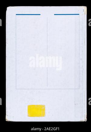 Back cover of a book with a yellow blank label, isolated on a black background. Stock Photo