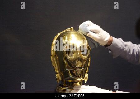 https://l450v.alamy.com/450v/2ae2p06/sothebys-gallery-assistant-matthew-floris-polishes-the-return-of-the-jedi-a-promotional-c-3po-helmet-from-1983-before-it-is-encased-on-a-stand-ahead-of-the-star-wars-collectibles-online-only-sale-at-the-london-auction-house-2ae2p06.jpg