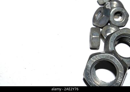 Collection of Old Bolt, Screws, Nuts Engineering Metal Tools on White Background Stock Photo