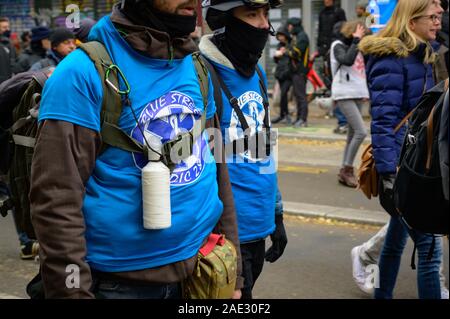 PARIS, FRANCE, DECEMBER 05 2019 : street medics ready to provide first aid during a 'Gilets Jaunes' (Yellow Vests) protest. Stock Photo