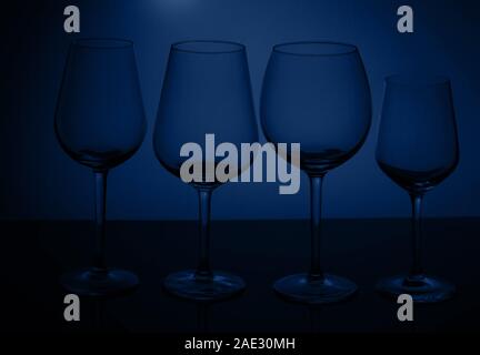 Wine glasses on blue Stock Photo