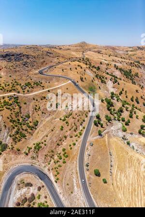 Aerial view of Kahta Sincik Road near the village of Taslica, District of Kahta, Adiyaman Province, Turkey. Winding roads surrounded by nature Stock Photo