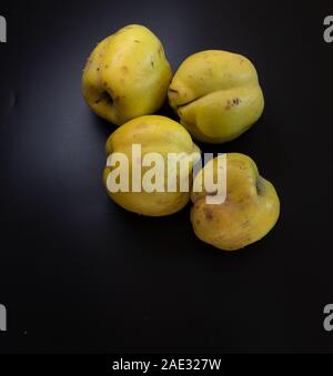 Ingredients for making apple quince jam on black backround Stock Photo