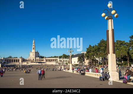 Fatima, Portugal - May 12, 2019: View of the Shrine of Fatima with pilgrims waiting for the procession of the candles. Stock Photo