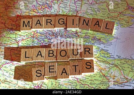 Marginal Labour Seats spelt in Scrabble letters on a UK map - General Election, elections, party political,leaders,parties,claims,doubts Stock Photo