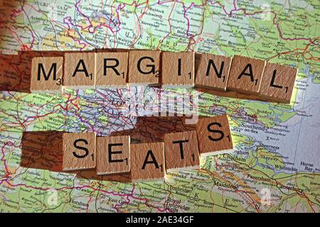 Marginal Seats spelt in Scrabble letters on a UK map - General Election, elections, party political,leaders,parties,claims,doubts