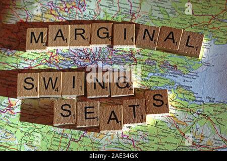 Marginal Swing Seats spelt in Scrabble letters on a UK map - General Election, elections, party political,leaders,parties,claims,doubts