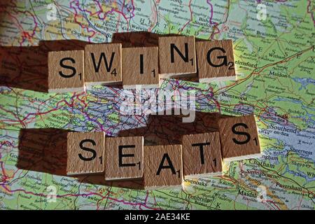 Swing Seats spelled in Scrabble letters on a UK map - General Election, elections, party political,leaders,parties,claims,doubts