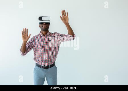 Cheerful handsome afro american man testing vr glasses Stock Photo