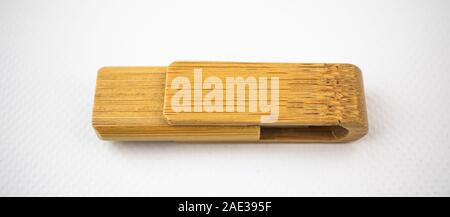 Wooden memory unit with usb connection for data storage, on white background Stock Photo