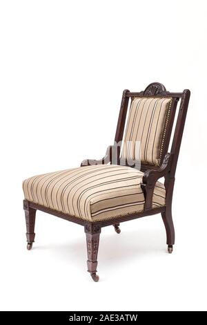 Vintage armchair of late 19th century on the white background Stock Photo