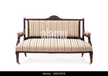 Antique couch (sofa) on white background. Stock Photo