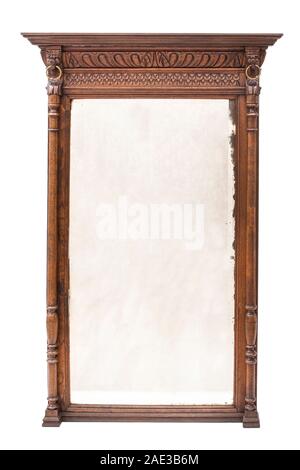 Antique mirror with carved wood frame on the white background. Stock Photo