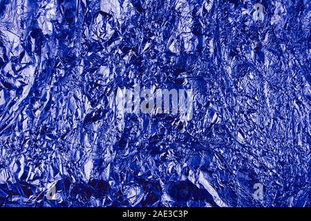 Abstract crumpled foil background. Grunge photo background. Classic Blue Stock Photo