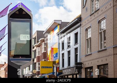 Eindhoven, Netherlands October 10, 2019. Big advertising panel and shops in the city center, autumn sunny day Stock Photo