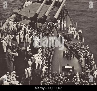 The end of a great dream. Sailors of the US Missouri battleship (USS Missouri are watching the start of the surrender ceremony of Japan after its defe Stock Photo