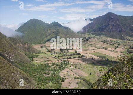 Patchwork quilt agriculture inside of the Pululahua Crater, Pululahua Geobotanical Reserve, Ecuado Stock Photo