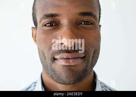 Handsome afro american man standing against white background Stock Photo