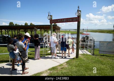 tourists boarding boggy creek airboat rides lake tohopekaliga central florida usa Stock Photo