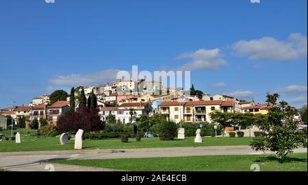 Cityscape of the ancient Adriatic seaside town of Vrsar, Croatia, looking up at the hill to the old town Stock Photo