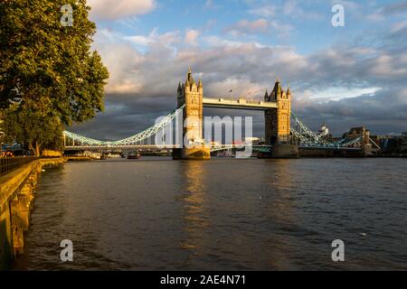 London  - September 06 2019: Dark clouds behind the Iconic Tower Bridge with a bit of afternoon light on the towers adding natural contrast,  London S