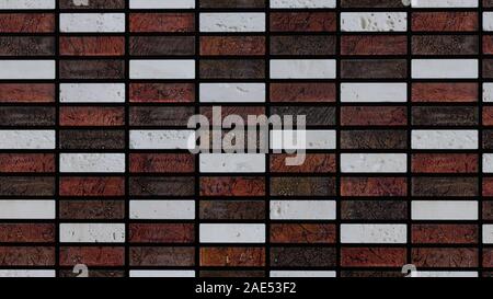 Background texture of red and white rectangular tiles. Stock Photo