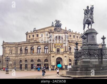 John of Saxony Monument equestrian sculpture King Johann on a horse and Semperoper Dresden in Theaterplatz Dresden Saxony Germany. Stock Photo