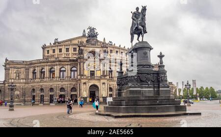 John of Saxony Monument equestrian sculpture King Johann on a horse and Semperoper Dresden in Theaterplatz Dresden Saxony Germany. Stock Photo