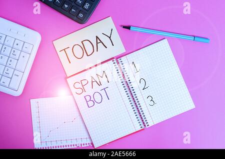 Handwriting text Spam Bot. Conceptual photo autonomous program on the Internet that sends spam to users Writing equipments and computer stuffs placed Stock Photo