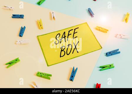 Word writing text Safe Box. Business photo showcasing A small structure where you can keep important or valuable things Colored clothespin paper empty Stock Photo