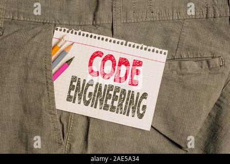 Conceptual hand writing showing Code Engineering. Concept meaning application of engineering to the development of software Writing equipment and whit Stock Photo