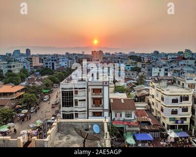 Mandalay, Myanmar - Sept 2019: Sunset view over the busy city centre of Mandalay in Myanmar, formerly called Burma Stock Photo