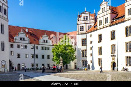 Cobblestone courtyard of Castle Hartenfels Altstadt Torgau Saxony Germany Stock Photo