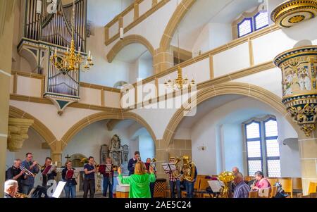 Brass band playing in Castle Hartenfels chapel the first Protestant church in the world, Altstadt Torgau Saxony Germany. Stock Photo