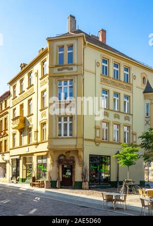 Collegienstrasse Altstadt cobblestone street with heritage buildings shops restaurants and cafes in Lutherstadt Wittenberg Saxony-Anhalt Germany. Stock Photo