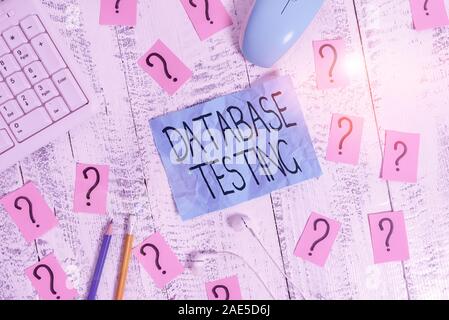 Handwriting text writing Database Testing. Conceptual photo involves the retrieved values from the database by the web Writing tools, computer stuff a Stock Photo
