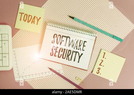 Text sign showing Software Security. Business photo showcasing implemented to protect software against malicious attack Writing equipments and compute Stock Photo