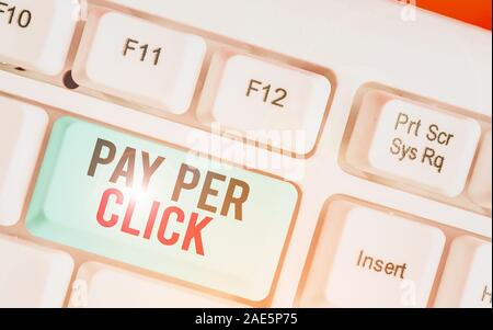 Writing note showing Pay Per Click. Business concept for Internet Advertising Model Search Engine marketing Strategy Stock Photo