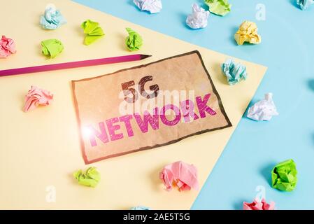 Handwriting text writing 5G Network. Conceptual photo greatly increase the speed and responsiveness of wireless network Colored crumpled papers empty Stock Photo