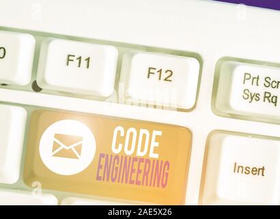 Writing note showing Code Engineering. Business concept for application of engineering to the development of software Stock Photo